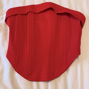 Beginning Boutique red crop top size 4. Strapless with ribbed design.